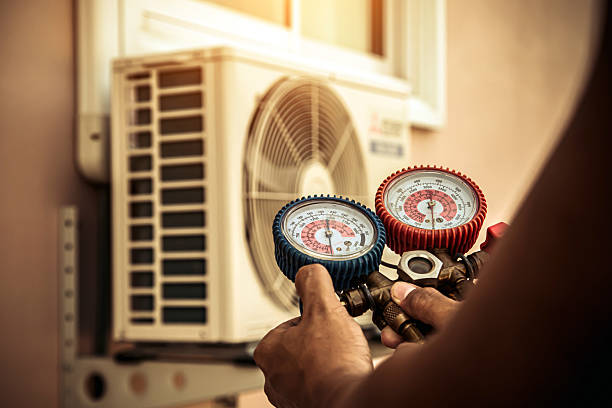 Professional Air Conditioning Service technician working in Leeds, AL